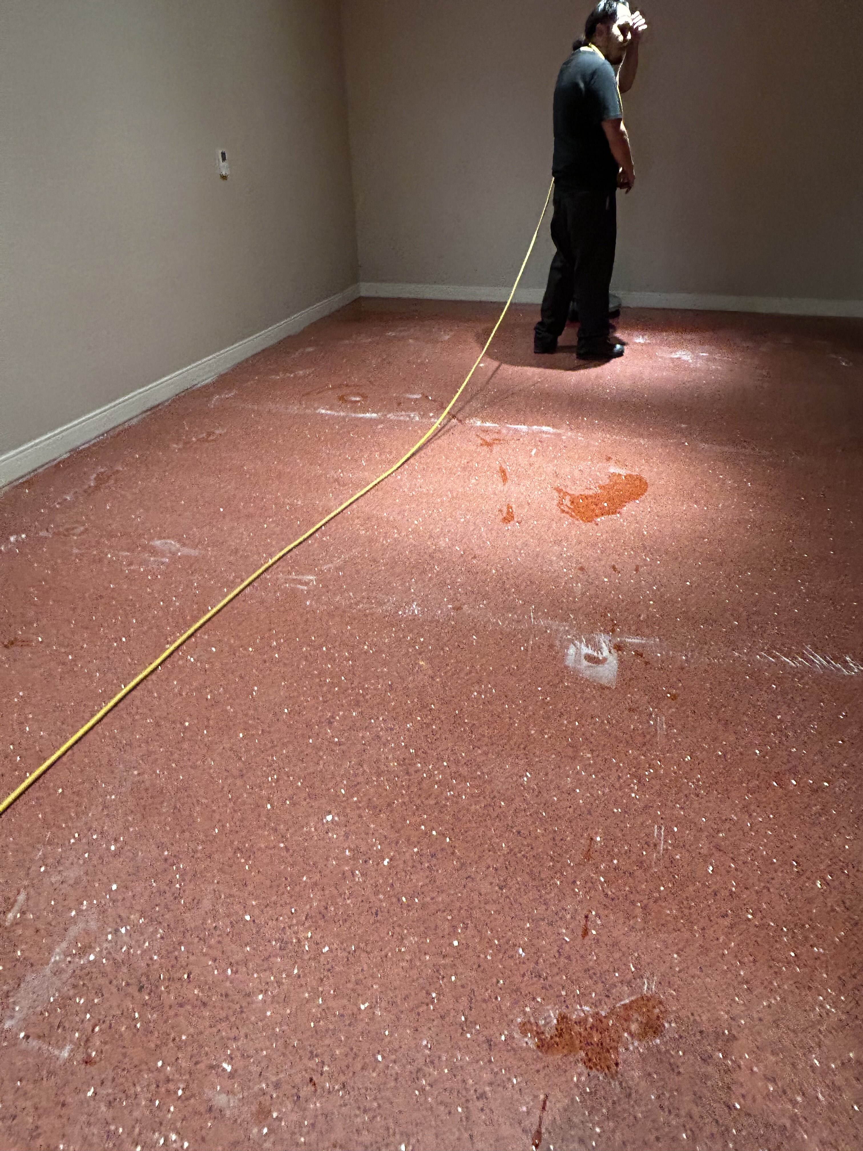Terrazzo floor being ground during restoration